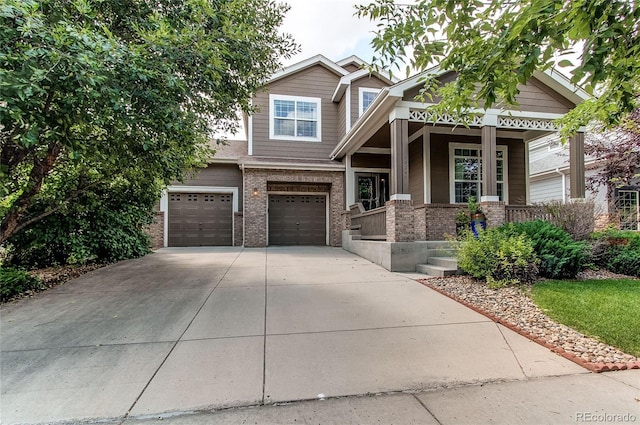 13241 Heart Lake Way, Broomfield, CO 80020 - craftsman-style house with brick siding, concrete driveway, a garage, and covered porch