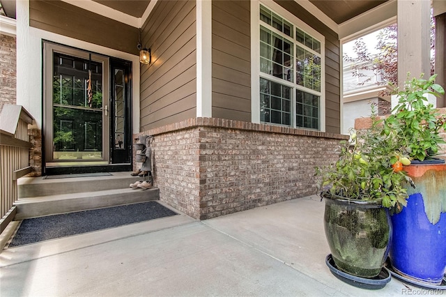 13241 Heart Lake Way, Broomfield, CO 80020 - view of exterior entry with brick siding and covered porch