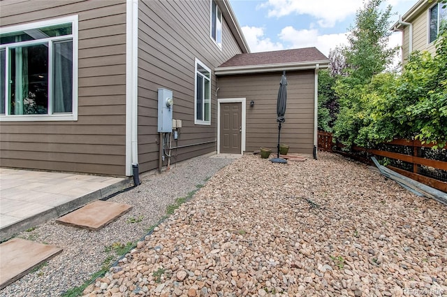 13241 Heart Lake Way, Broomfield, CO 80020 - view of side of home featuring a patio area