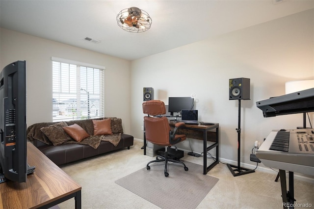 carpeted office featuring baseboards and visible vents