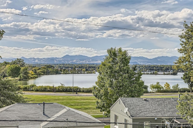 view of mountain feature featuring a water view