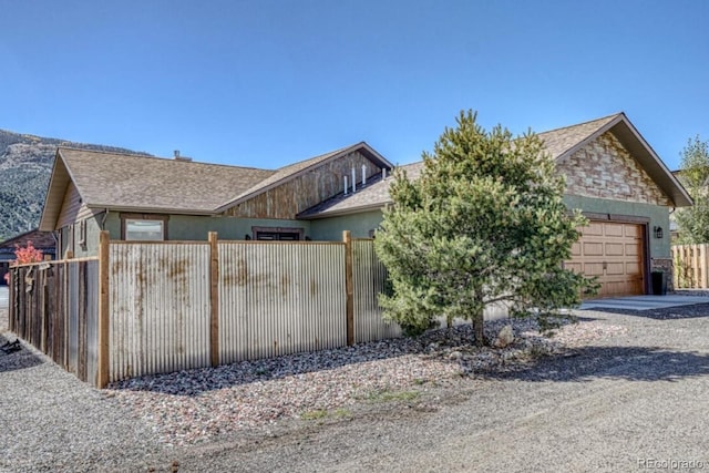 view of property exterior featuring a garage