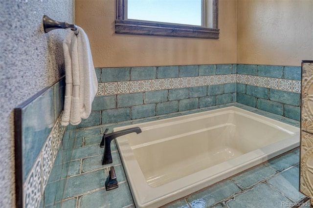 bathroom featuring a tub