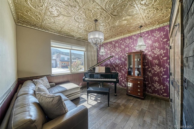 sitting room featuring dark wood-type flooring