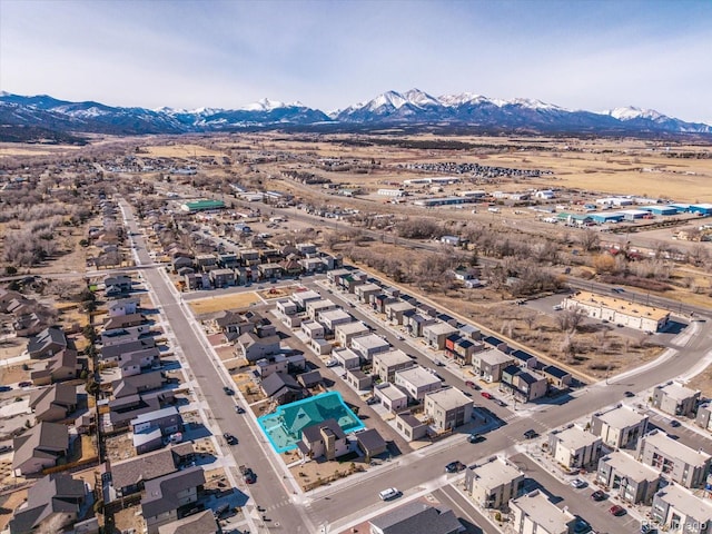 aerial view with a mountain view and a residential view