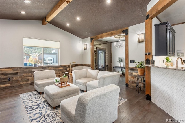living room with recessed lighting, wainscoting, vaulted ceiling with beams, and hardwood / wood-style floors