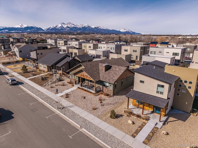 bird's eye view featuring a residential view and a mountain view