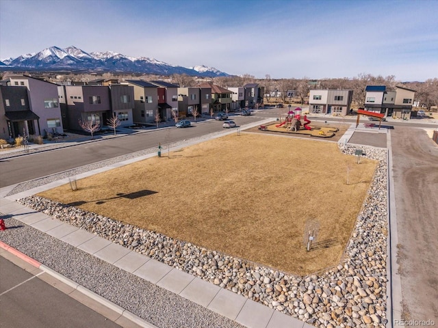 exterior space with a mountain view and a residential view