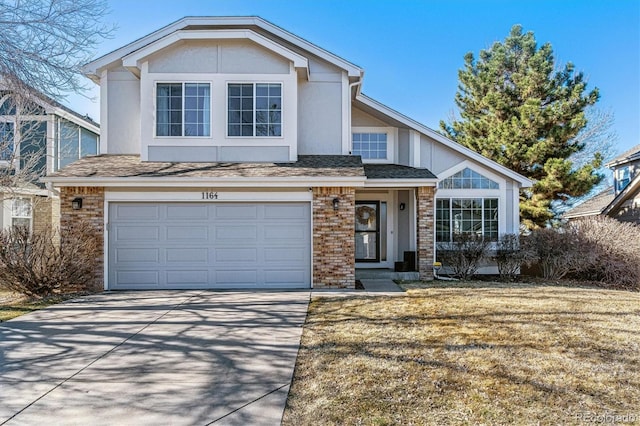 view of front of house with brick siding, an attached garage, roof with shingles, stucco siding, and driveway