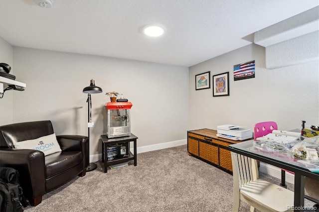 carpeted office with baseboards