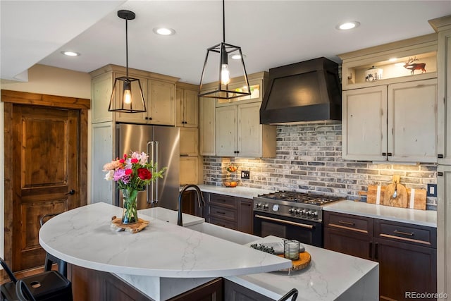 1194 Snyder Mountain Rd, Evergreen, CO 80439 - kitchen featuring premium range hood, premium appliances, backsplash, decorative light fixtures, and recessed lighting