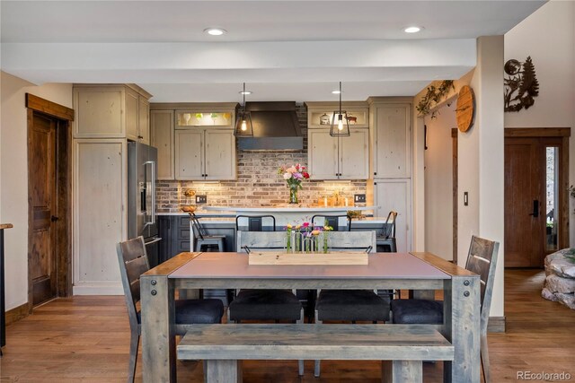 1194 Snyder Mountain Rd, Evergreen, CO 80439 - dining area featuring light wood finished floors and recessed lighting