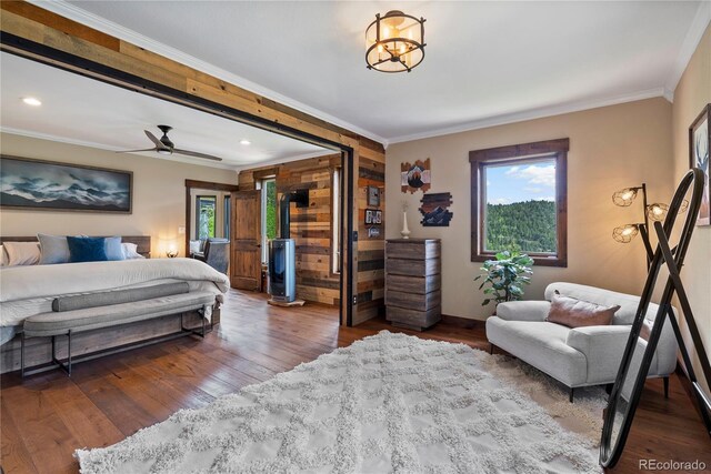 1194 Snyder Mountain Rd, Evergreen, CO 80439 - bedroom featuring ornamental molding, wood finished floors, and recessed lighting