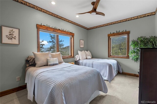 1194 Snyder Mountain Rd, Evergreen, CO 80439 - bedroom with light colored carpet, recessed lighting, and a ceiling fan