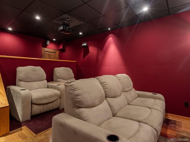 1194 Snyder Mountain Rd, Evergreen, CO 80439 - home theater room with a drop ceiling, recessed lighting, and wood finished floors
