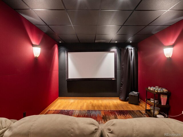 1194 Snyder Mountain Rd, Evergreen, CO 80439 - home theater room featuring a drop ceiling and wood finished floors
