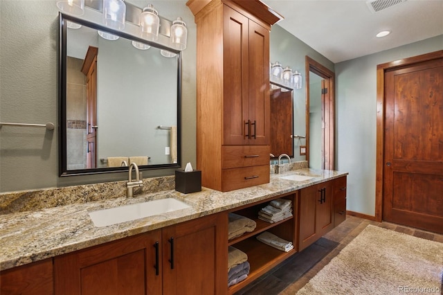 2754 County Rd 421, Florissant, CO 80816 - full bath featuring double vanity and baseboards