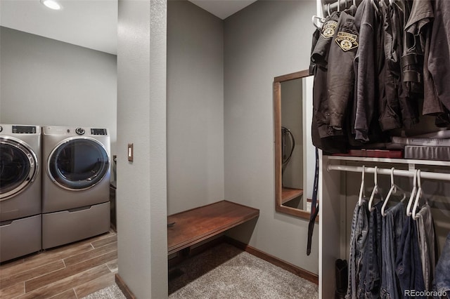 2754 County Rd 421, Florissant, CO 80816 - laundry room featuring washing machine and dryer, baseboards, wood finished floors, and recessed lighting