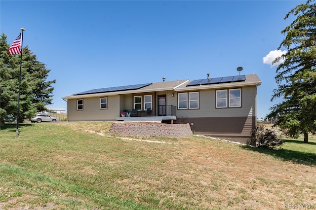 8804 Lariat Loop, Elizabeth, CO 80107 - view of front facade featuring roof mounted solar panels and a front yard