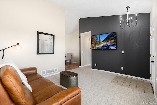 8804 Lariat Loop, Elizabeth, CO 80107 - carpeted living room featuring a chandelier and vaulted ceiling