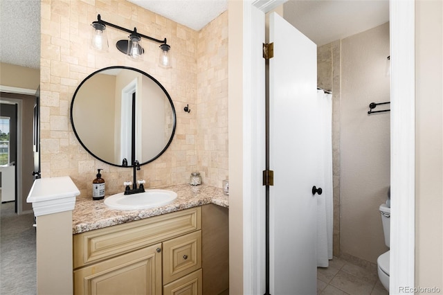 8804 Lariat Loop, Elizabeth, CO 80107 - bathroom featuring vanity, backsplash, and tile patterned floors