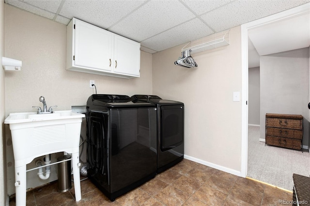 8804 Lariat Loop, Elizabeth, CO 80107 - laundry room featuring washer and dryer and cabinet space