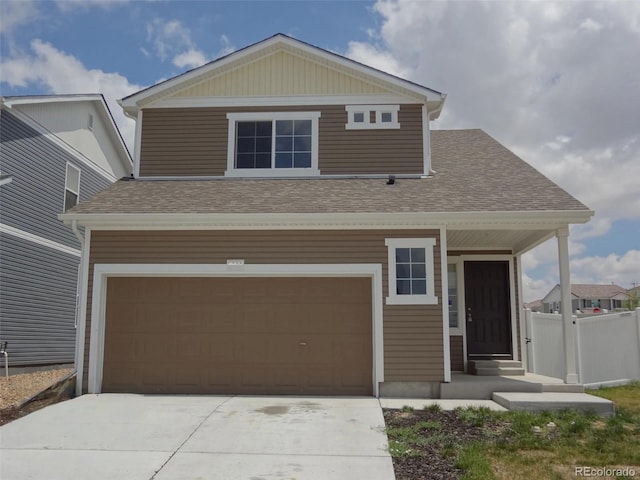 view of front of property featuring a garage