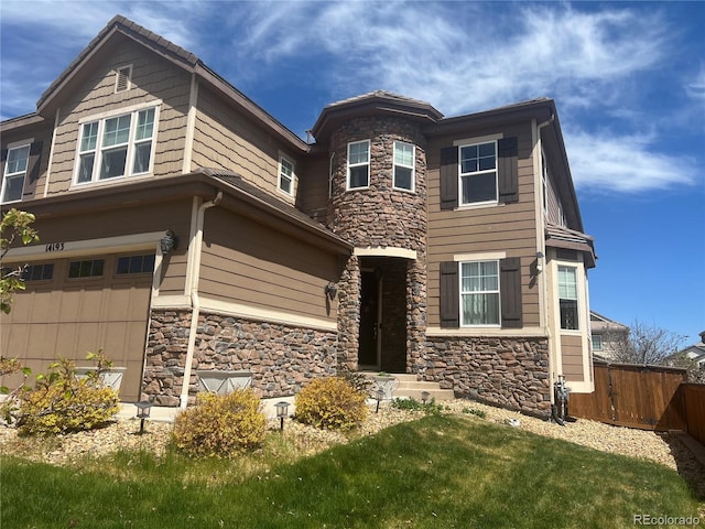 14193 Double Dutch Cir, Parker, CO 80134 - view of front of property featuring stone siding and an attached garage