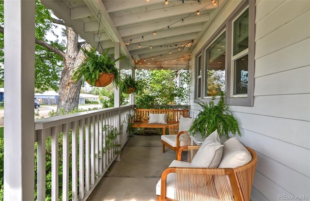 balcony featuring a porch