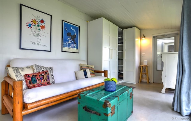 living area with wood ceiling