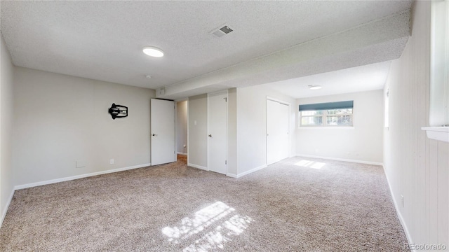 11718 Keough Dr, Northglenn, CO 80233 - carpeted empty room with a textured ceiling and baseboards