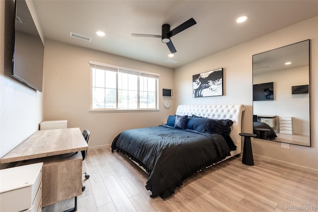 bedroom with baseboards, recessed lighting, visible vents, and light wood-type flooring