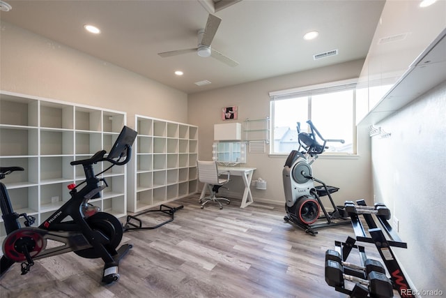 exercise room featuring recessed lighting, visible vents, wood finished floors, and a ceiling fan