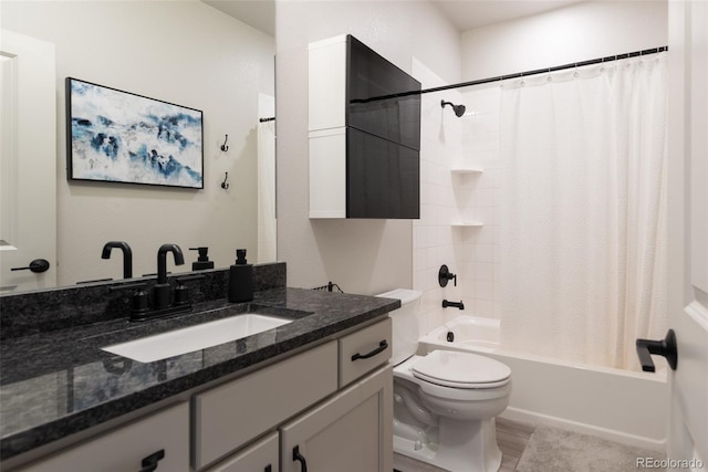 full bathroom featuring vanity, toilet, and shower / bathtub combination with curtain