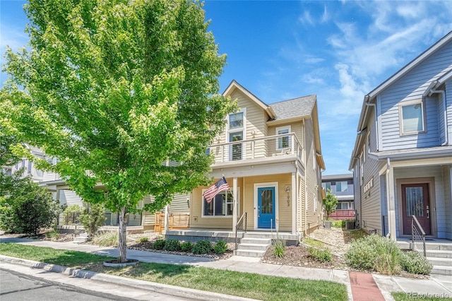 1903 W 66th Ave, Denver, CO 80221 - view of front facade featuring a balcony
