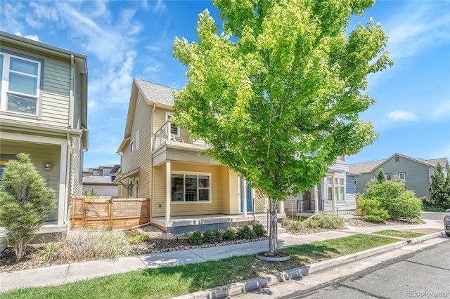 1903 W 66th Ave, Denver, CO 80221 - obstructed view of property with covered porch and a residential view