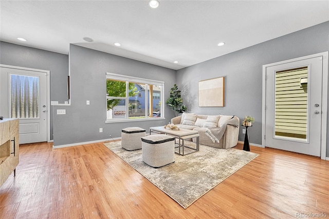 1903 W 66th Ave, Denver, CO 80221 - living area with light wood-type flooring and recessed lighting