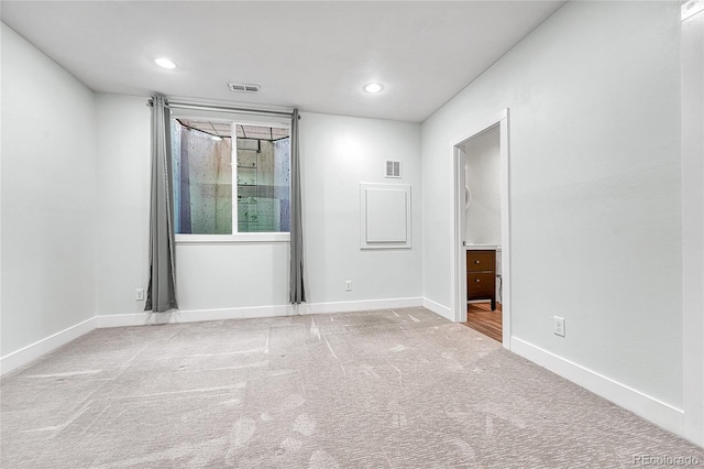1903 W 66th Ave, Denver, CO 80221 - spare room featuring carpet floors and recessed lighting