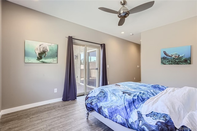 28424 Tepees Way, Evergreen, CO 80439 - bedroom with access to outside, wood finished floors, a ceiling fan, and recessed lighting