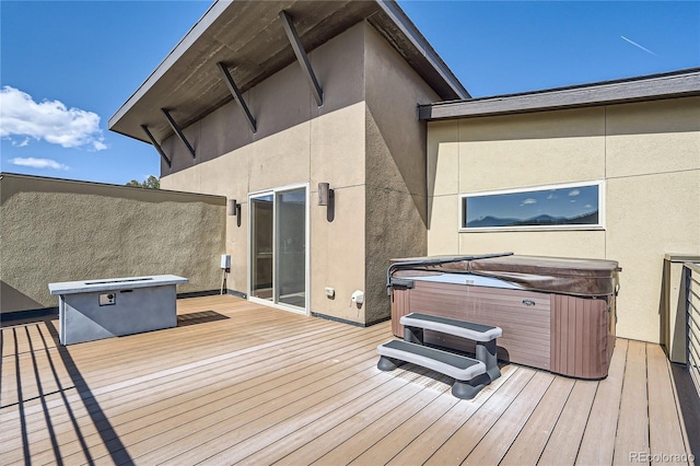 28424 Tepees Way, Evergreen, CO 80439 - deck with a hot tub
