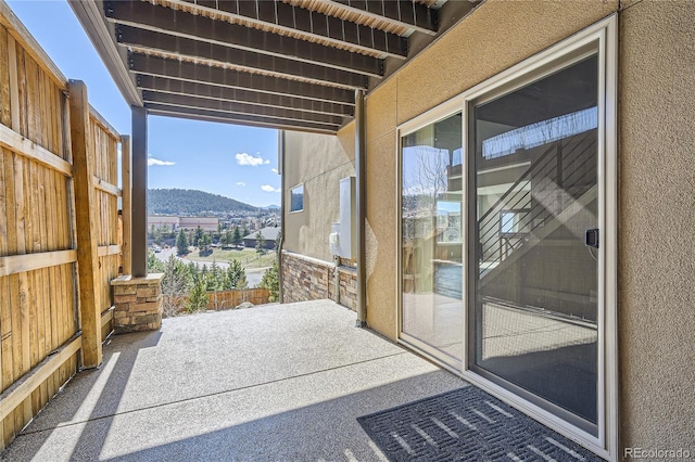 28424 Tepees Way, Evergreen, CO 80439 - view of patio / terrace featuring a mountain view