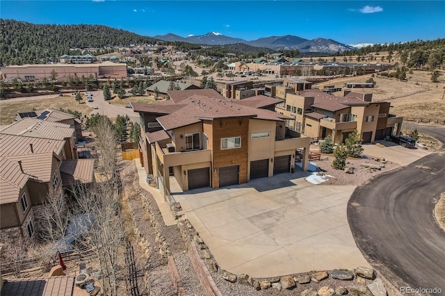28424 Tepees Way, Evergreen, CO 80439 - aerial view of residential area featuring mountains