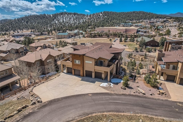 28424 Tepees Way, Evergreen, CO 80439 - aerial perspective of suburban area with a mountain backdrop