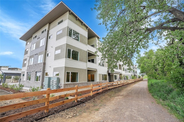 view of property featuring fence