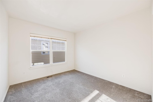 view of carpeted spare room