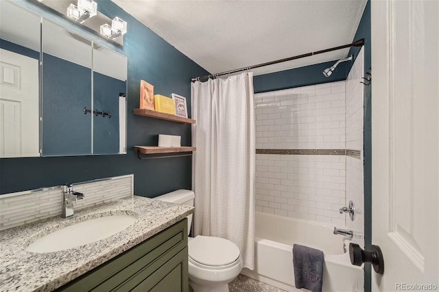 full bathroom with tasteful backsplash, toilet, vanity, and shower / bath combo with shower curtain