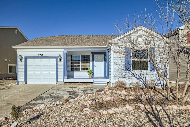 single story home featuring a garage