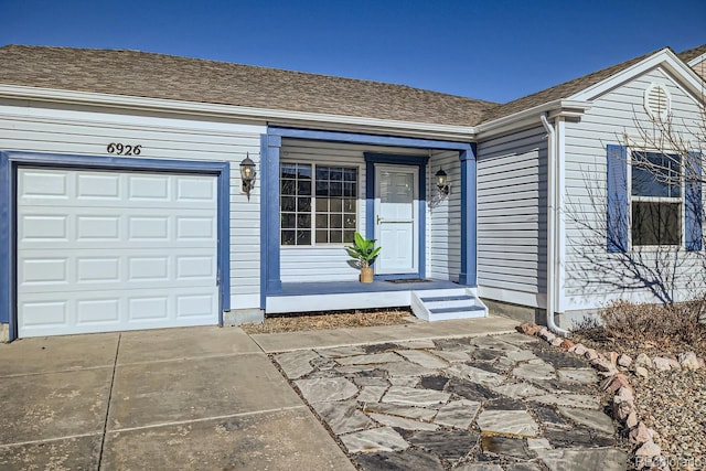 property entrance with a garage