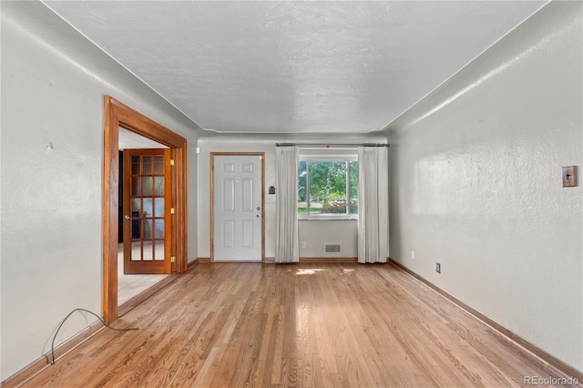 4815 S Pennsylvania St, Englewood, CO 80113 - unfurnished room featuring light wood finished floors and baseboards