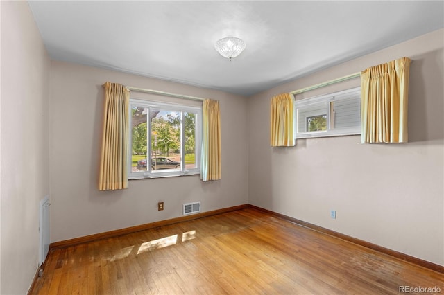 4815 S Pennsylvania St, Englewood, CO 80113 - empty room featuring hardwood / wood-style flooring and baseboards